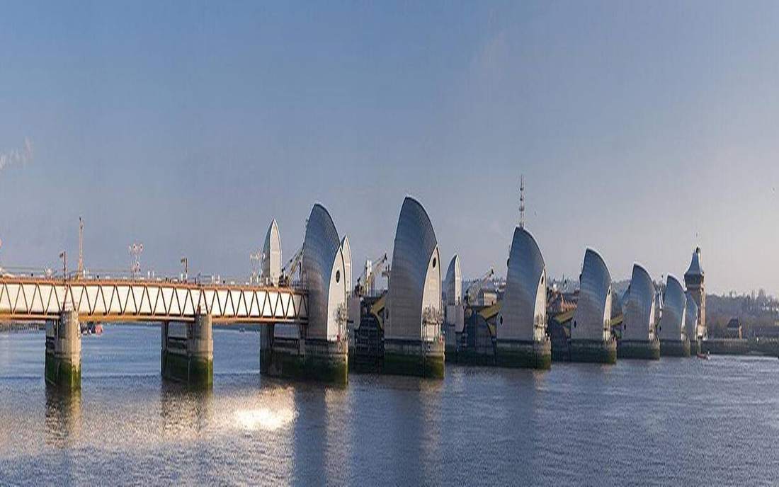 The Thames Barrier spanning the drowned tidal Thames in east London.