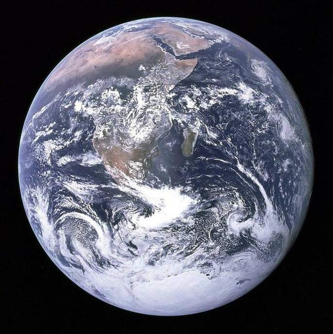 Apollo 17 Blue Marble: the whole sunlit Earth as a sphere, Africa and Arabia under cloud.