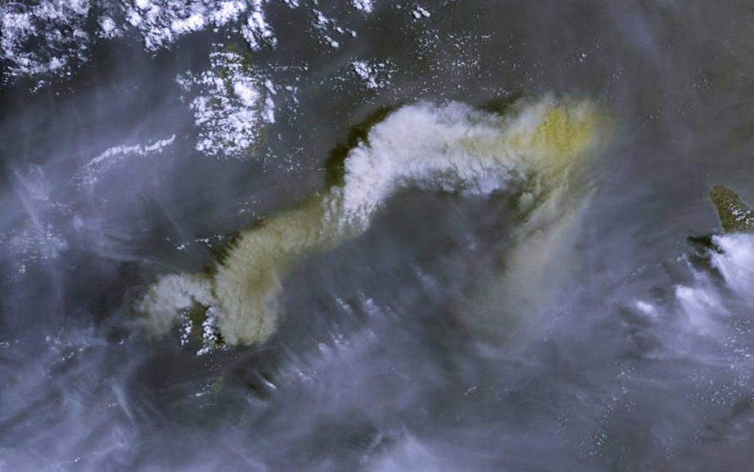 An eruption column — process as a hazard.