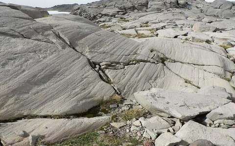 Abrasion in the river-erosion lab — a TERMS crop, not the glossary plate and not the lab cover.